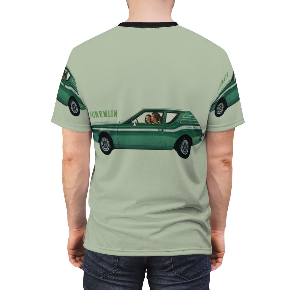 A vintage-style t-shirt featuring a retro green gremlin car design in a cool, striped pattern. - men back