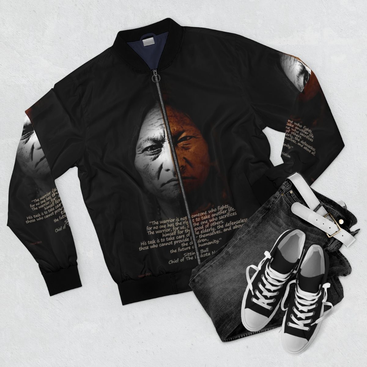 Stylish bomber jacket featuring a Sitting Bull warrior quote, modern Native American wall art design - Flat lay