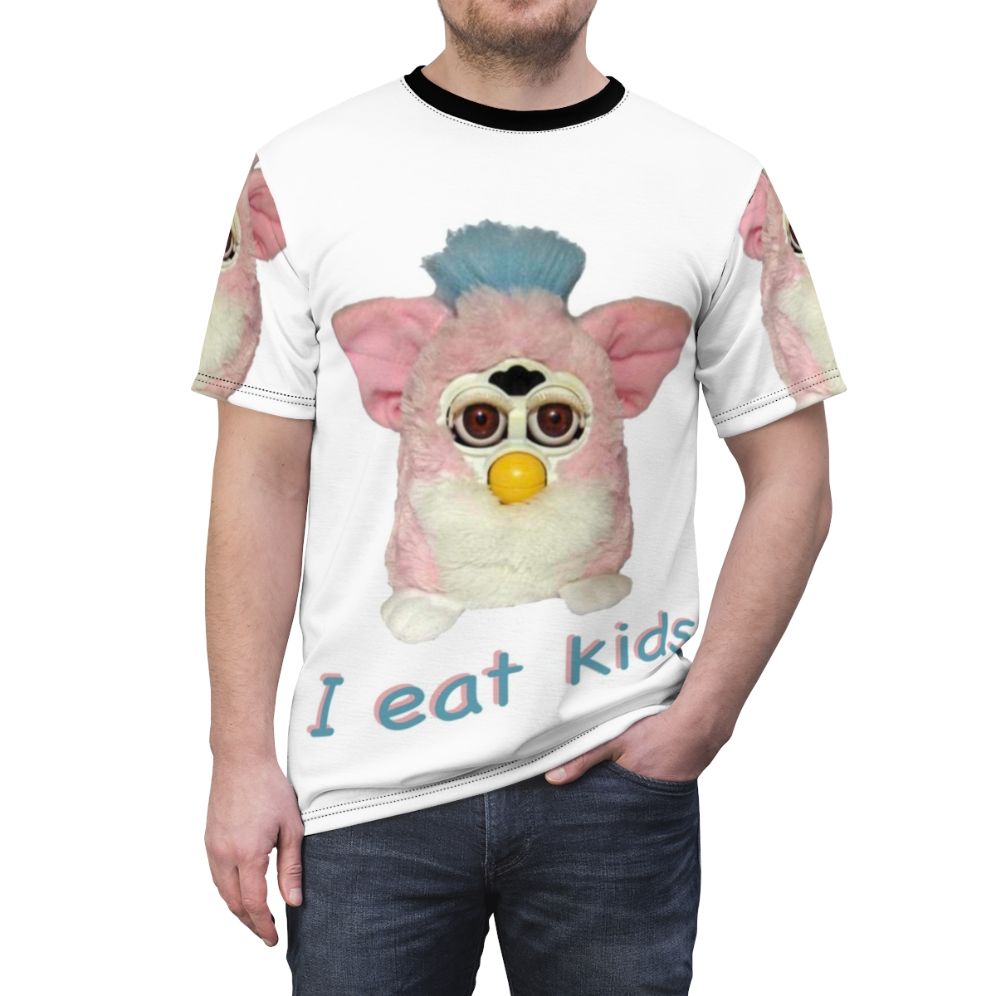 Graphical t-shirt design featuring a cursed Furby character with the text "I Eat Kids" - men front