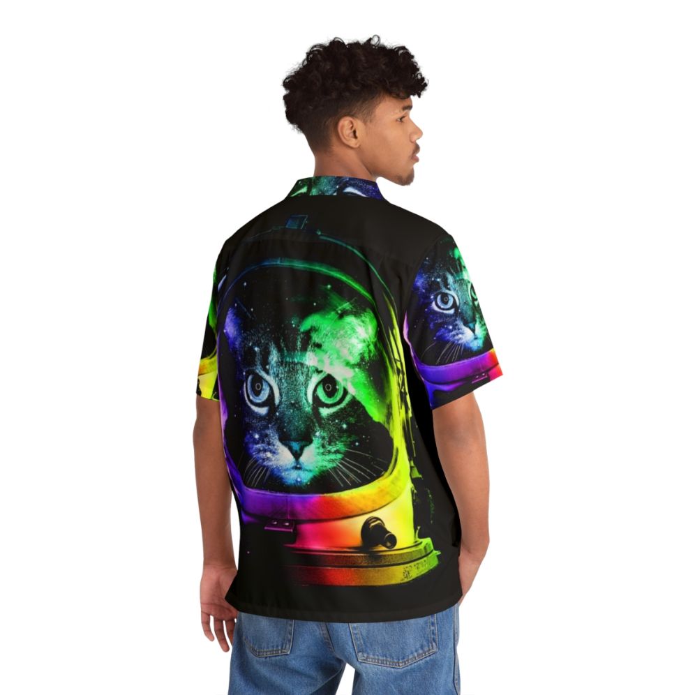 Astronaut cat wearing a colorful Hawaiian style shirt with a space and galaxy themed print - People Back