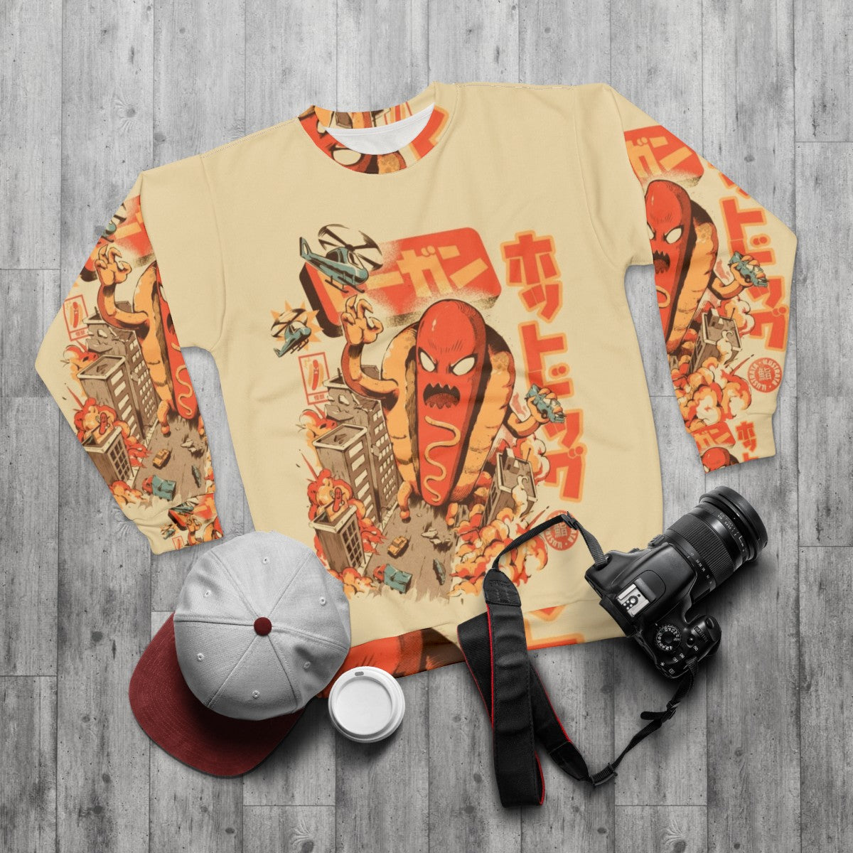 Retro hot dog sweatshirt with Japanese-inspired funny anime monster design - flat lay