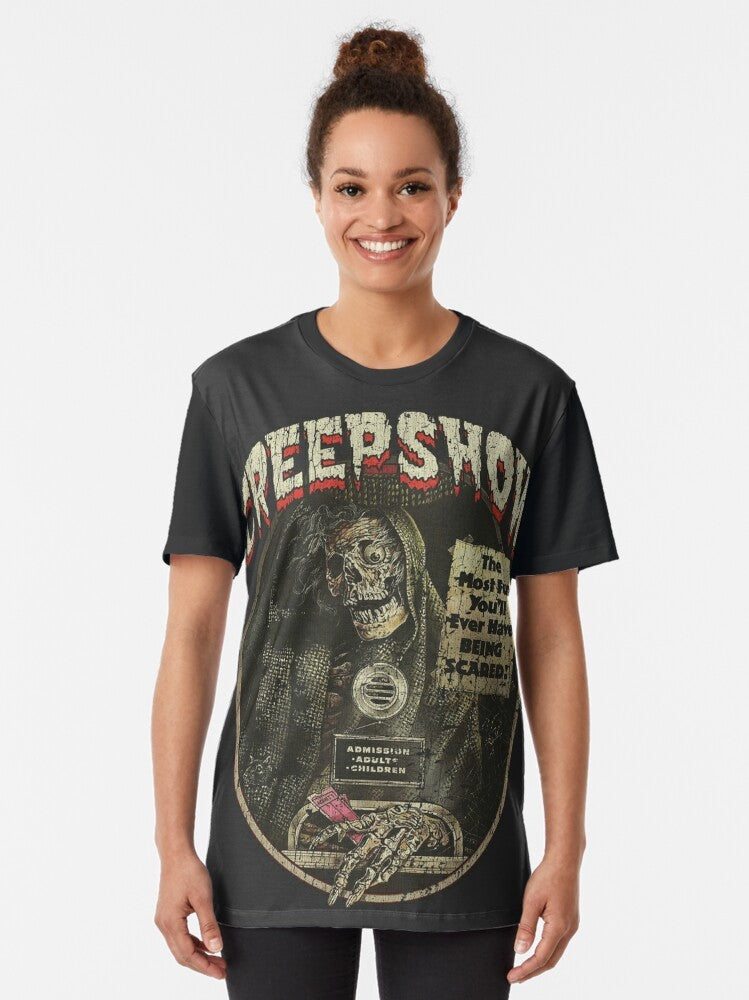 Creepshow 1982 horror movie graphic t-shirt featuring a spooky skeleton and classic 1980s horror design - Women