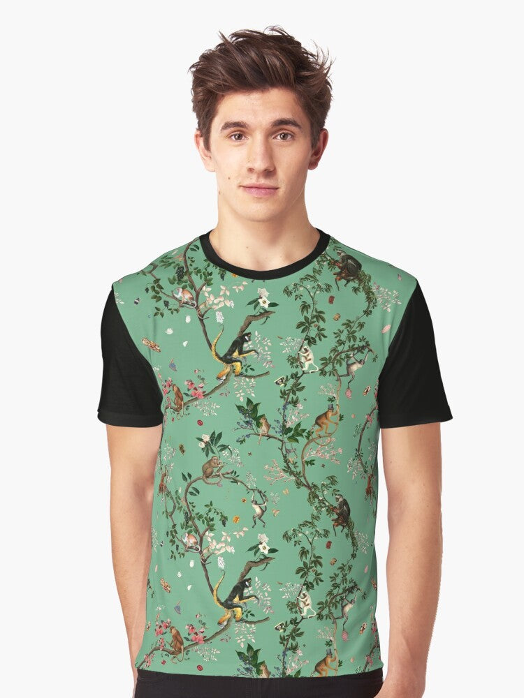 A vibrant green t-shirt featuring a playful monkey design amidst a lush, tropical floral pattern. - Men