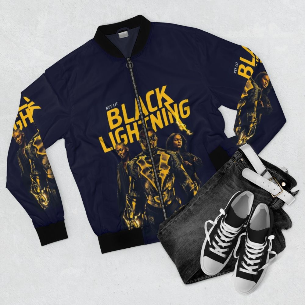 Black Lightning Bomber Jacket featuring Cress Williams, Nafessa Williams, and China Anne McClain - Flat lay