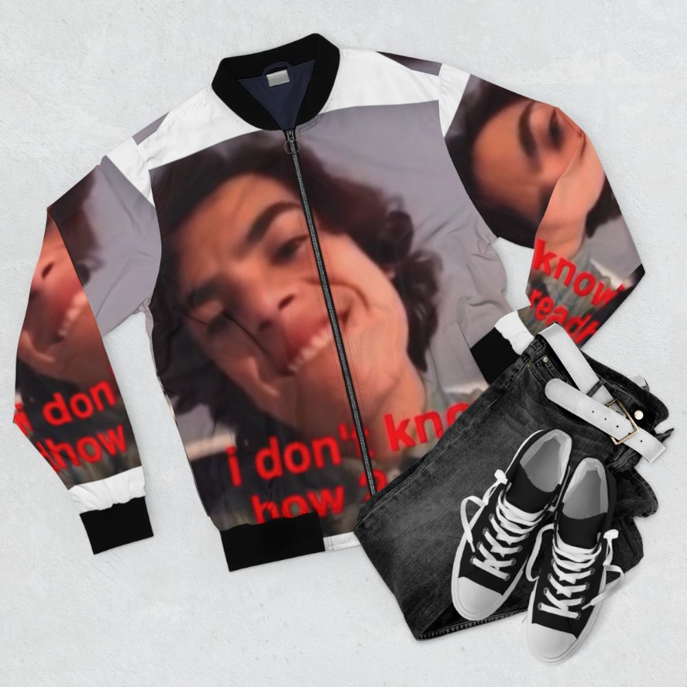 Vintage-inspired bomber jacket featuring popular vine meme graphics - Flat lay