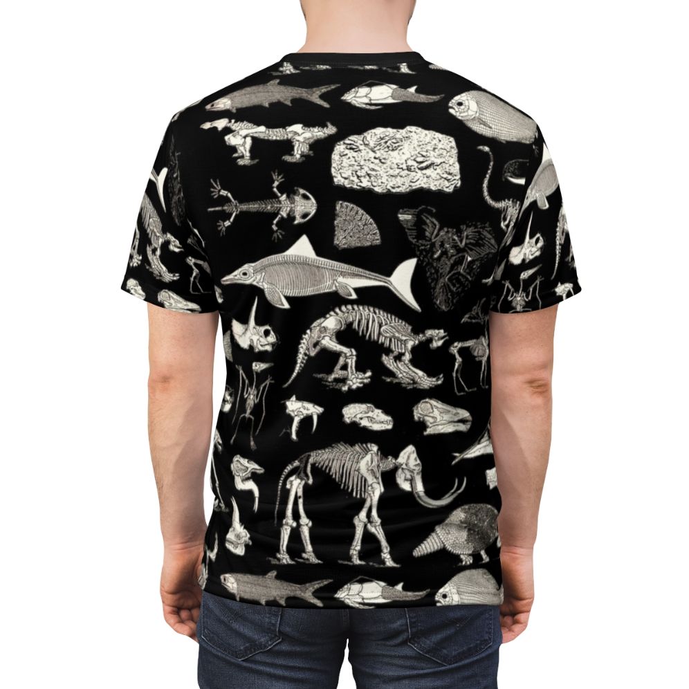 Paleontology inspired t-shirt featuring a vintage-style illustration of fossils, skeletons, and prehistoric animals - men back