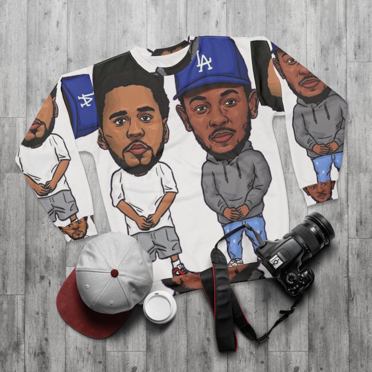 Kendrick Lamar x J Cole Rap Artist Sweatshirt with Hip Hop Pop Art Design - flat lay