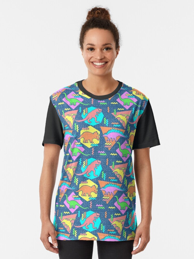 Retro-style graphic t-shirt with a pattern of nineties-inspired dinosaur designs, including Tyrannosaurus Rex, Pterodactyl, and more. - Women