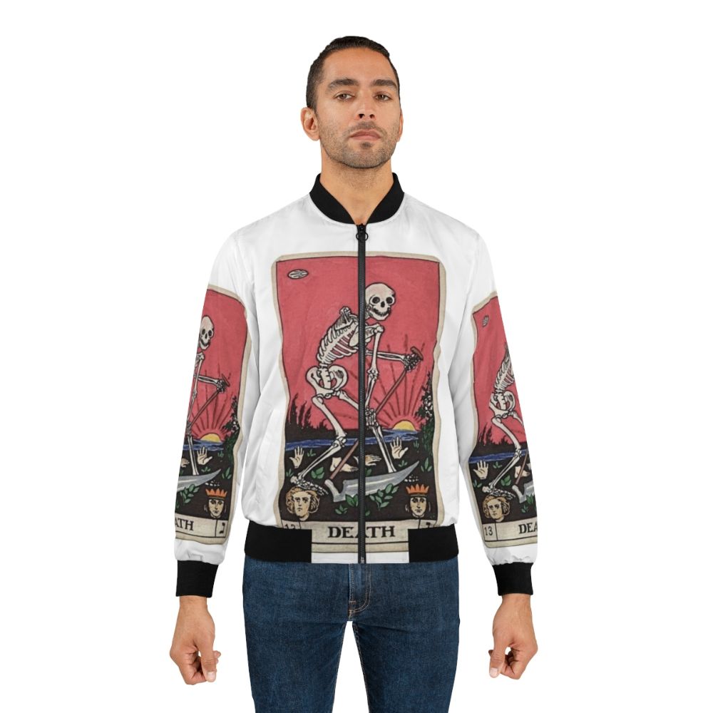 A vintage-inspired bomber jacket featuring the Death tarot card design, perfect for a spooky, occult, or supernatural aesthetic. - Lifestyle