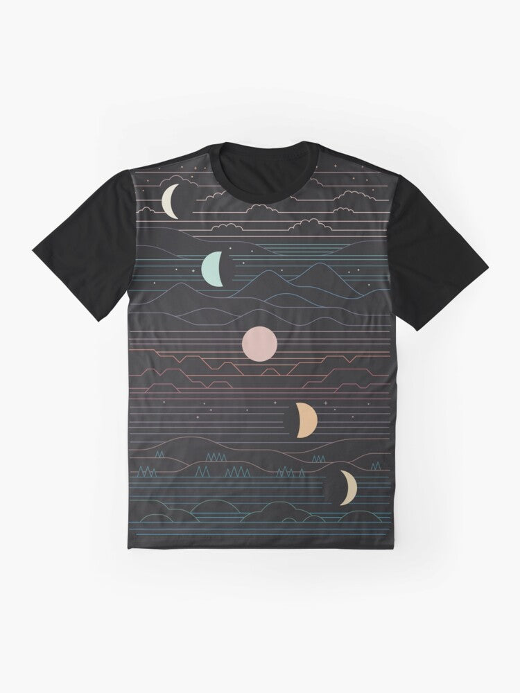 Graphic t-shirt featuring a design of a crescent moon and mountain landscape against a starry night sky - Flat lay