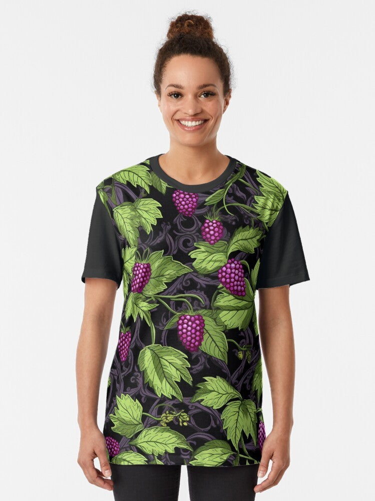 Vintage-style graphic t-shirt featuring vibrant marionberries and botanical elements in a whimsical, bohemian design. - Women