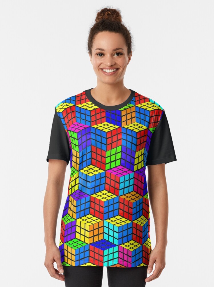 A vibrant and eye-catching graphic t-shirt featuring a Rubik's cube inspired optical illusion design with a Escher-esque, geometric, and abstract style. - Women