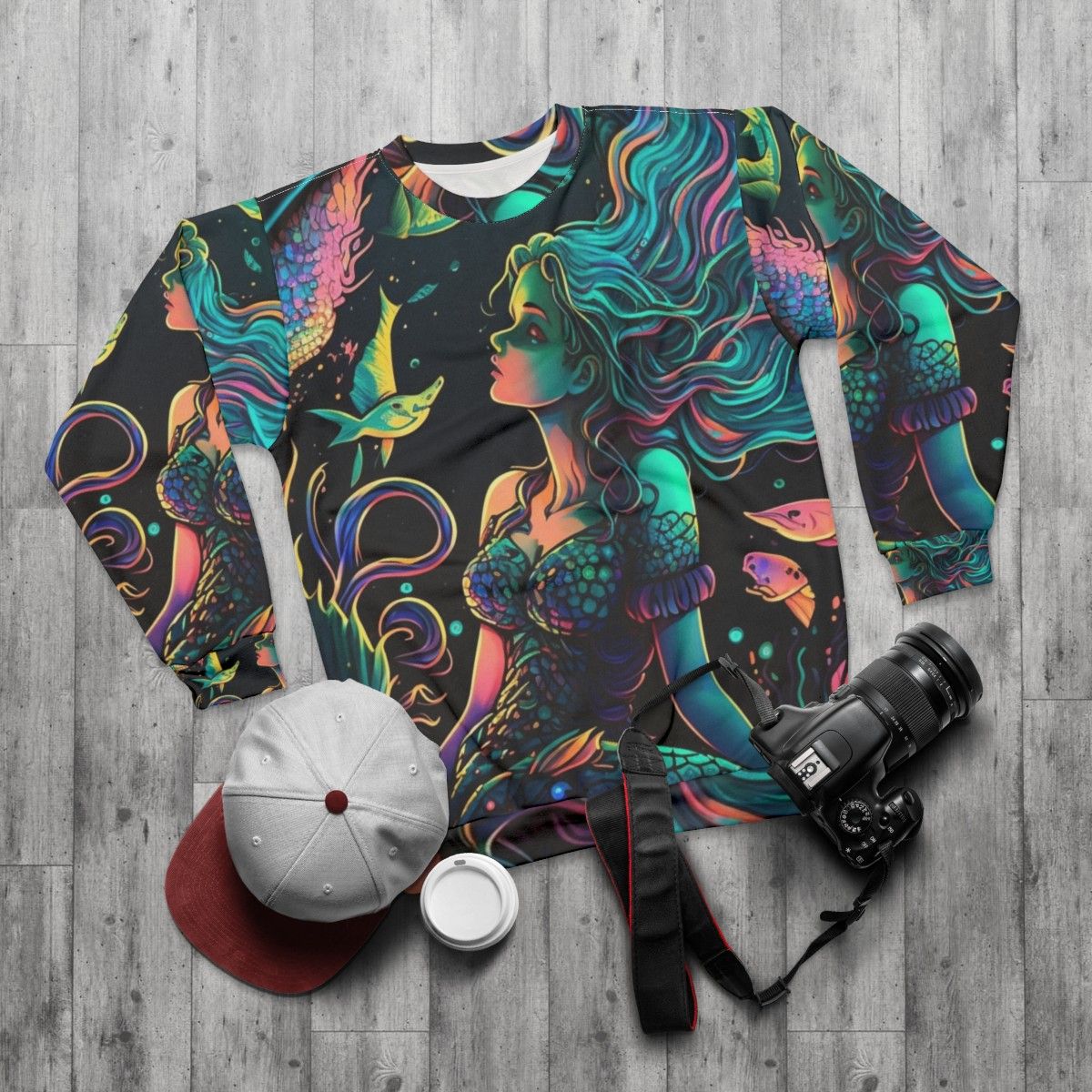 Mythical sea creatures sweatshirt featuring fantasy beasts - flat lay