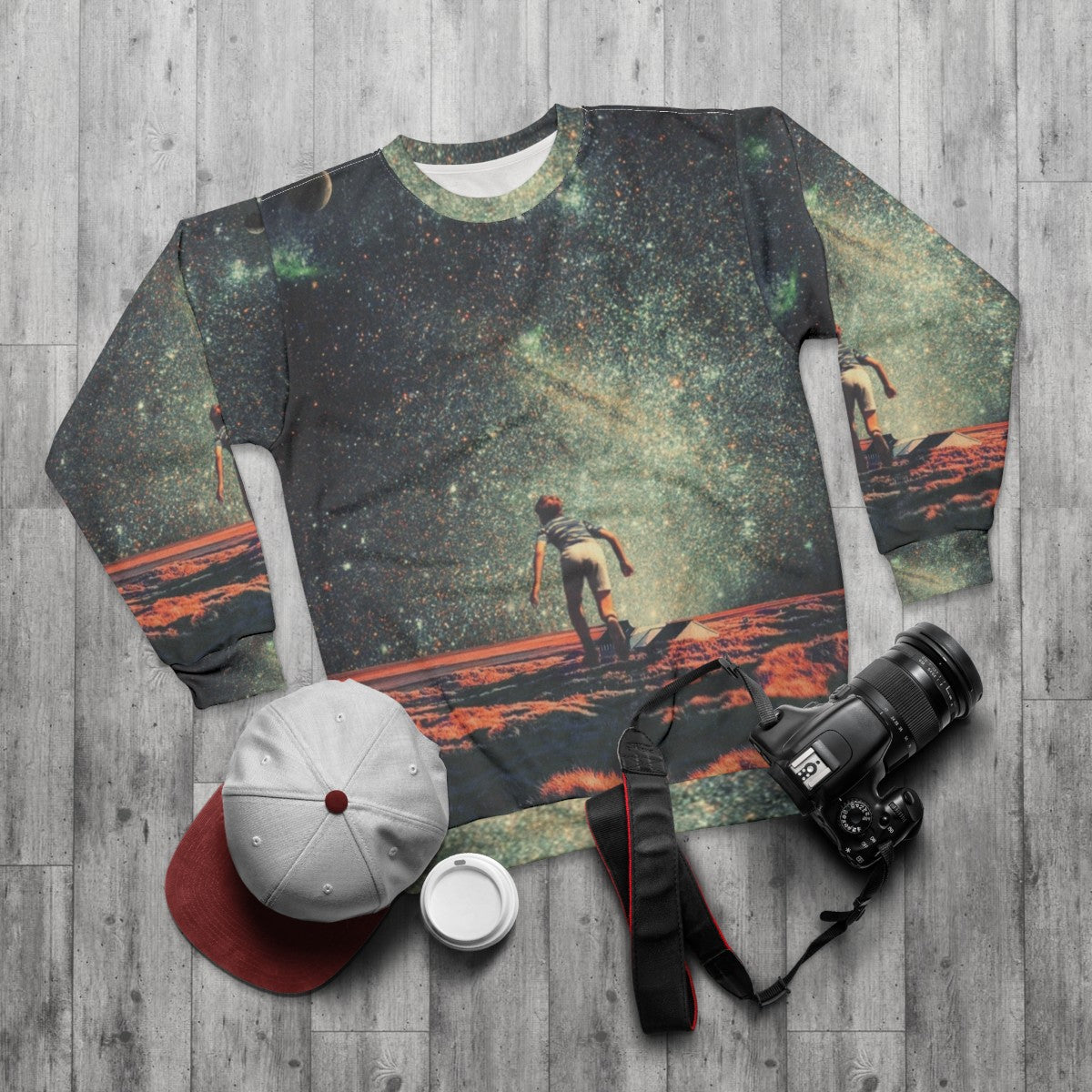 Nostalgia vintage graphic sweatshirt featuring a colorful collage design with space, stars, and retro elements - flat lay