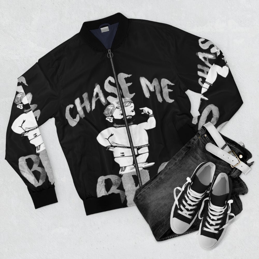 A vibrant bomber jacket featuring a "Chase Me Bro" design, perfect for the gay bear and chub chaser community. - Flat lay