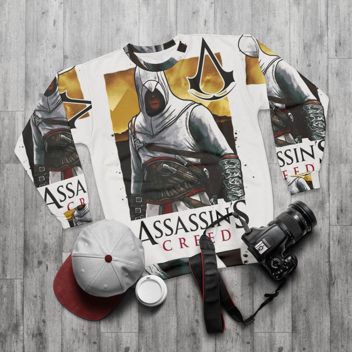 Assassin's Creed Sweatshirt featuring iconic game elements - flat lay