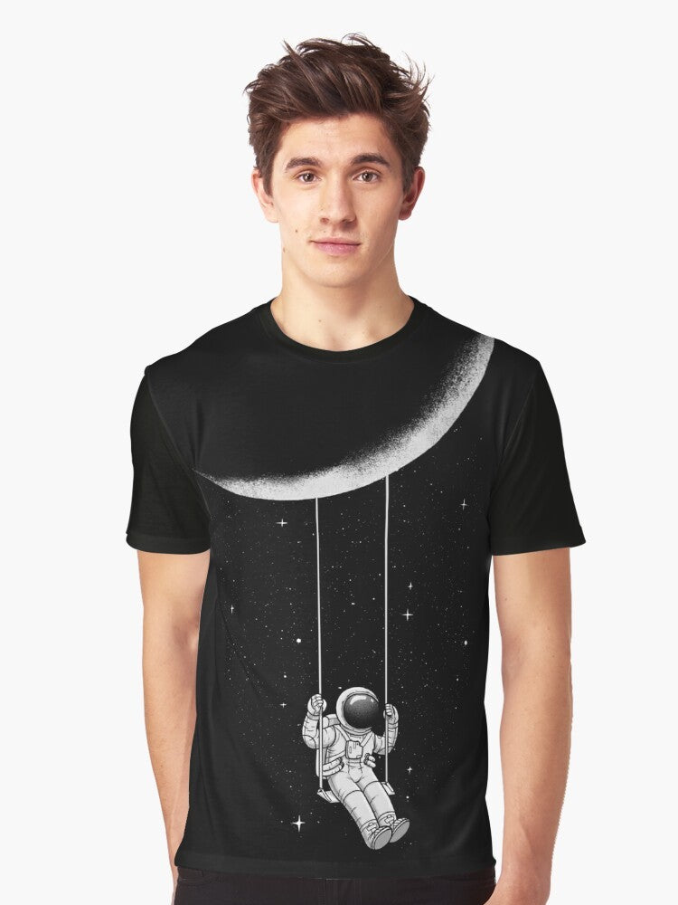 A surrealist black and white graphic t-shirt with an abstract moon swing design - Men