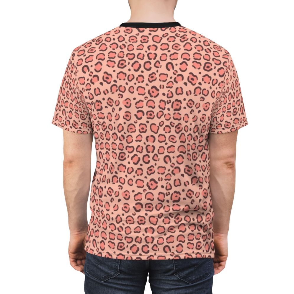 Closeup of a leopard skin print t-shirt design with a pink and black pattern. - men back