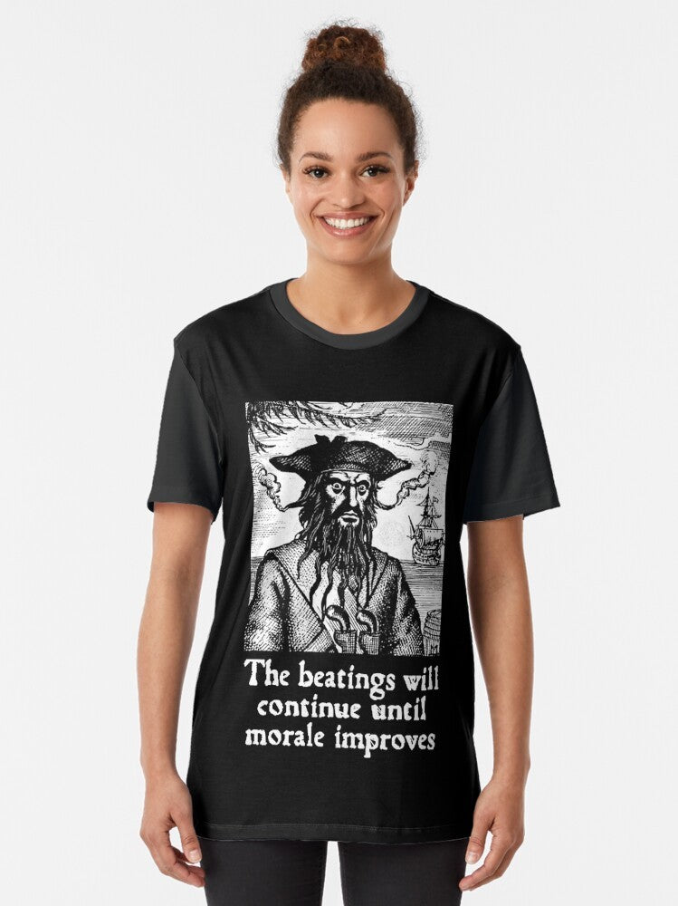 Pirate-inspired graphic t-shirt with the text "The Beatings Will Continue until Morale Improves" - Women