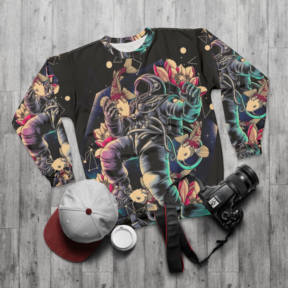 Man wearing deep space sweatshirt with geometric and cosmic design - flat lay