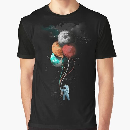 Graphic t-shirt featuring a surreal spaceman floating among planets and balloons in a space-themed design