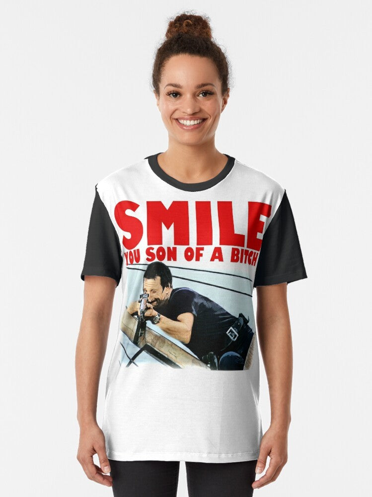 Graphic t-shirt with a retro Jaws movie-inspired design featuring a shark and the quote "Smile You Son of a Bitch" - Women