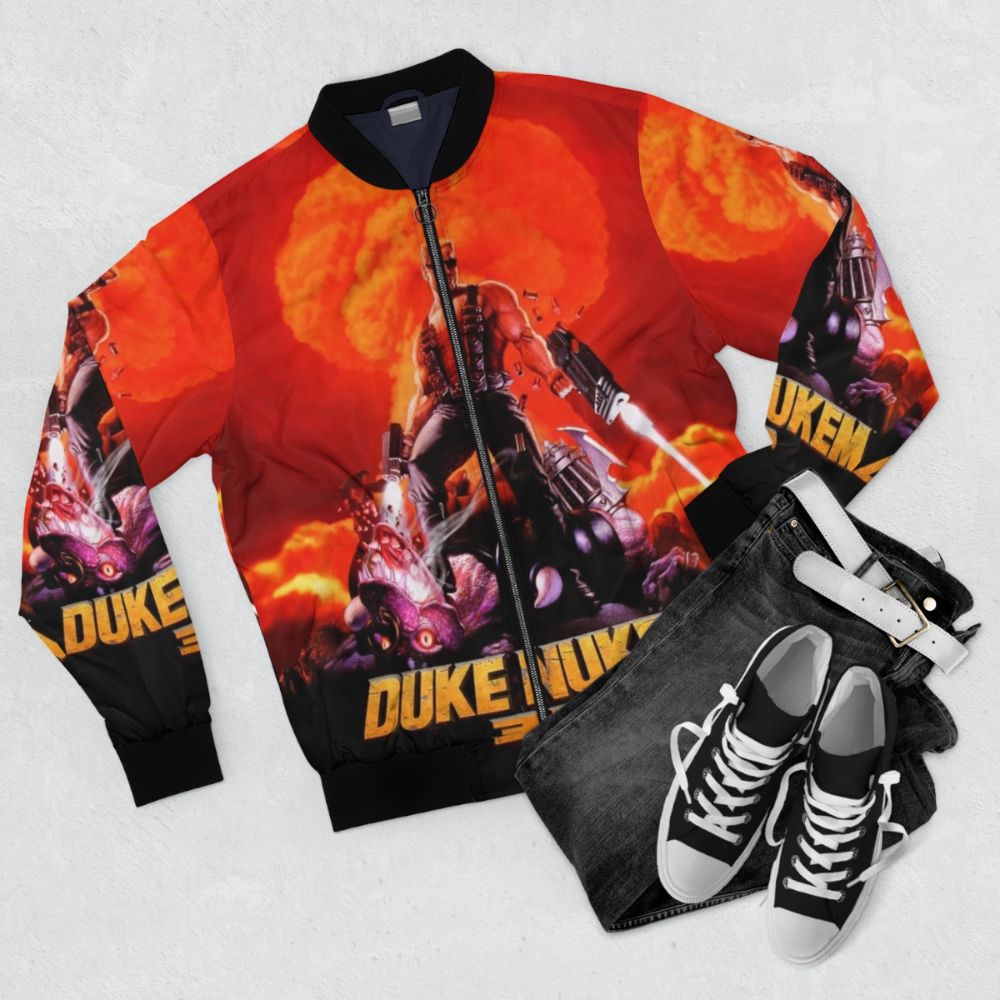 Duke Nukem 3D retro game print on a high contrast bomber jacket - Flat lay