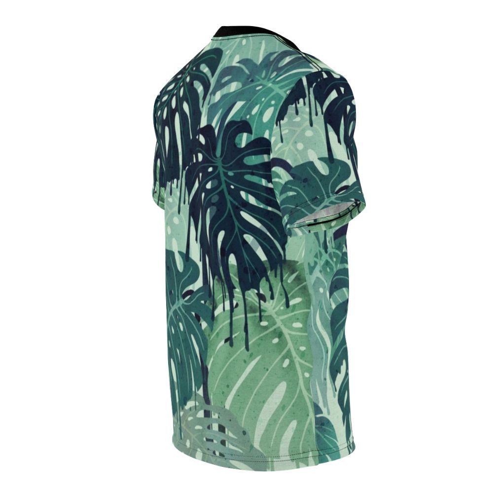 Closeup of a vibrant, tropical monstera leaf print on a t-shirt - men right