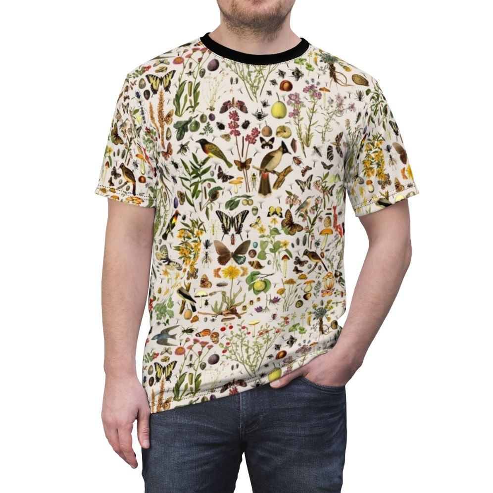 T-shirt featuring a detailed, seamless design of American plants, animals, and natural elements. - men front