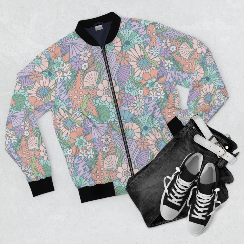 Mermaid Cove Floral Seashell Bomber Jacket with ocean-inspired design featuring shells, starfish, and whimsical floral patterns - Flat lay