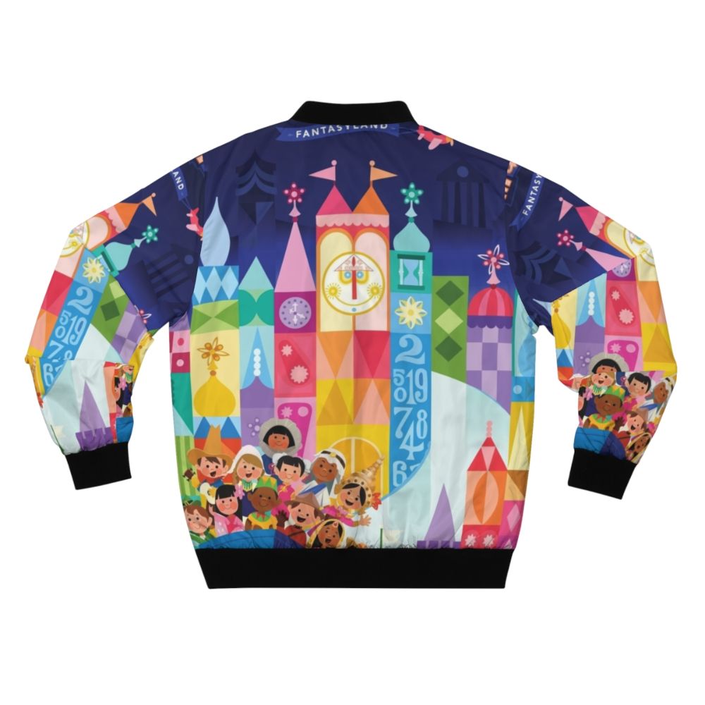 Colorful bomber jacket featuring a whimsical small world fantasyland design with children, boats, and a magical, dreamlike landscape. - Back