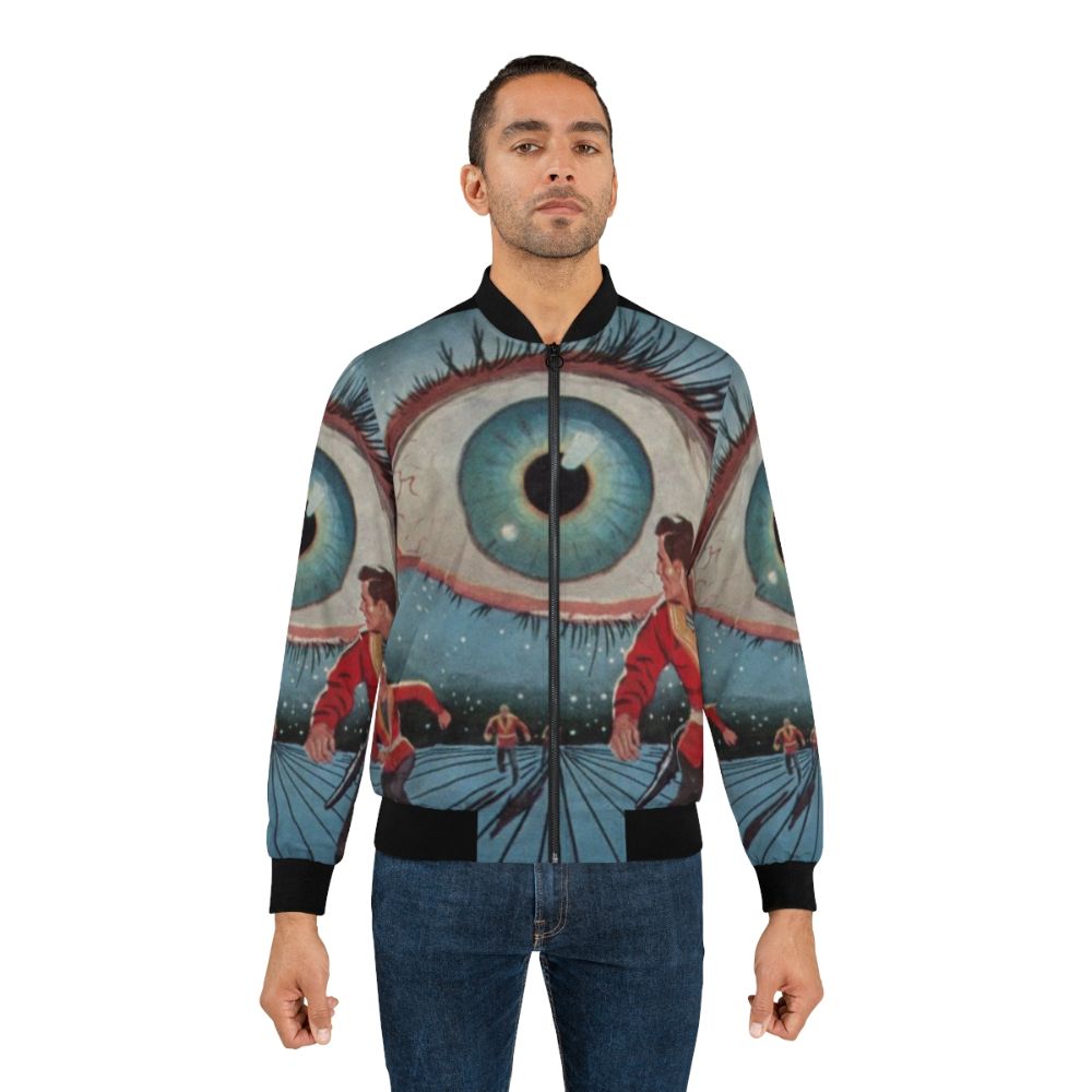 Stylish bomber jacket with futuristic, sci-fi inspired design elements like slotted eyes, metallic teeth, and mechanical arm. - Lifestyle