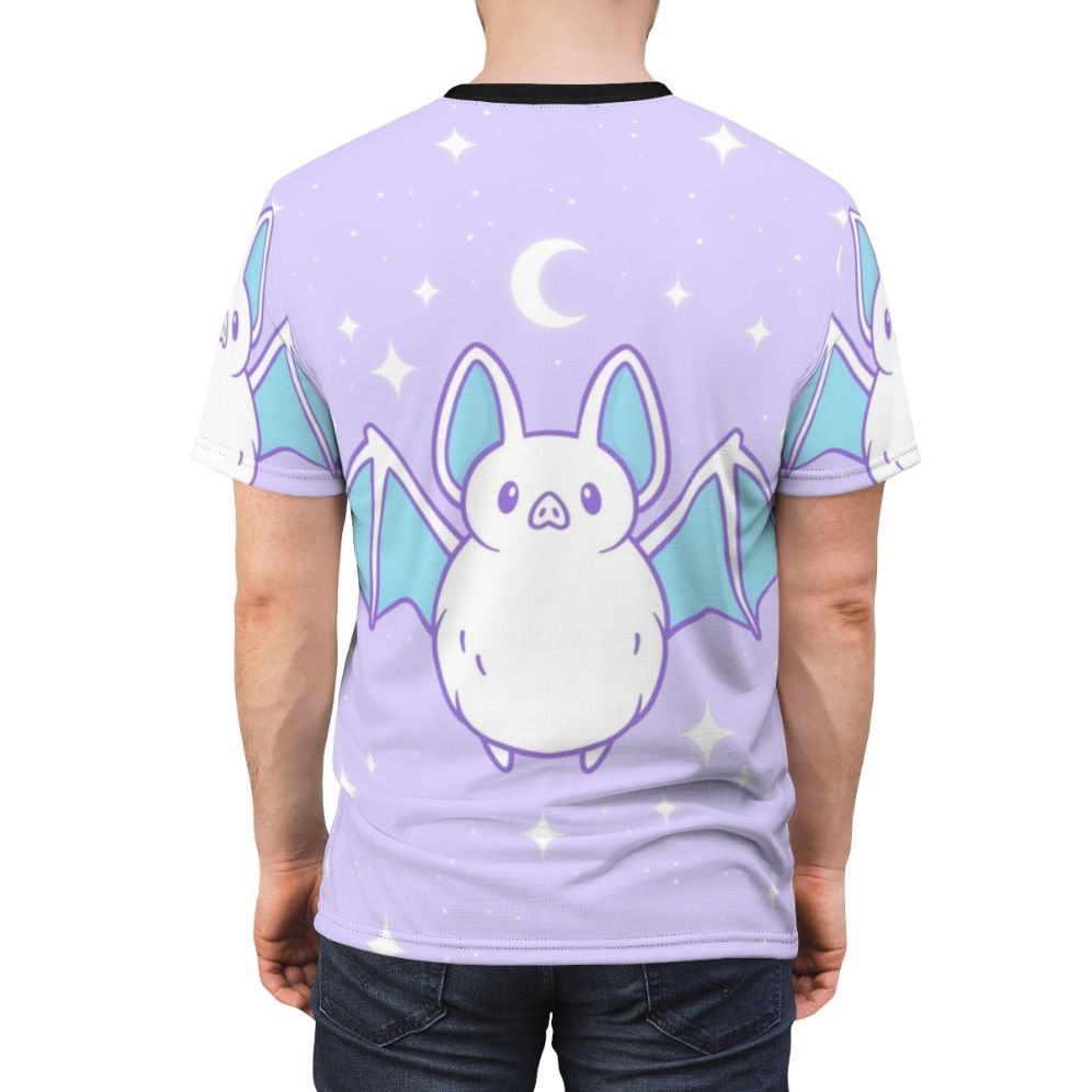 Pastel-colored bat graphic on a comfortable, high-quality t-shirt for fans of gothic, witchy, and autumn-inspired fashion. - men back