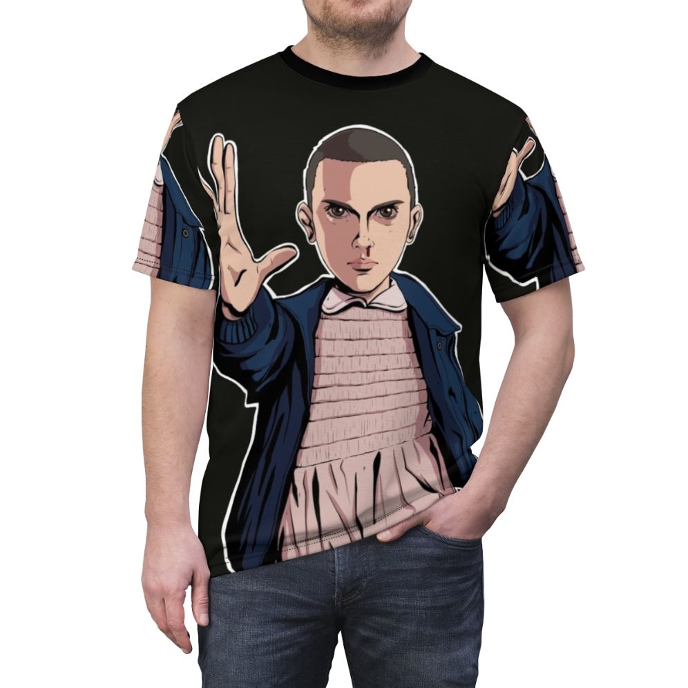 Illustration of Eleven from the Netflix series Stranger Things on an all-over-print t-shirt. - men front