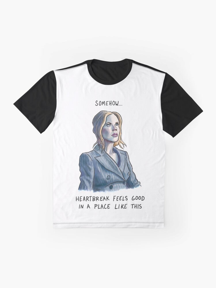 Nicole Kidman wearing a graphic t-shirt with the AMC logo and text "Heartbreak Feels Good" - Flat lay