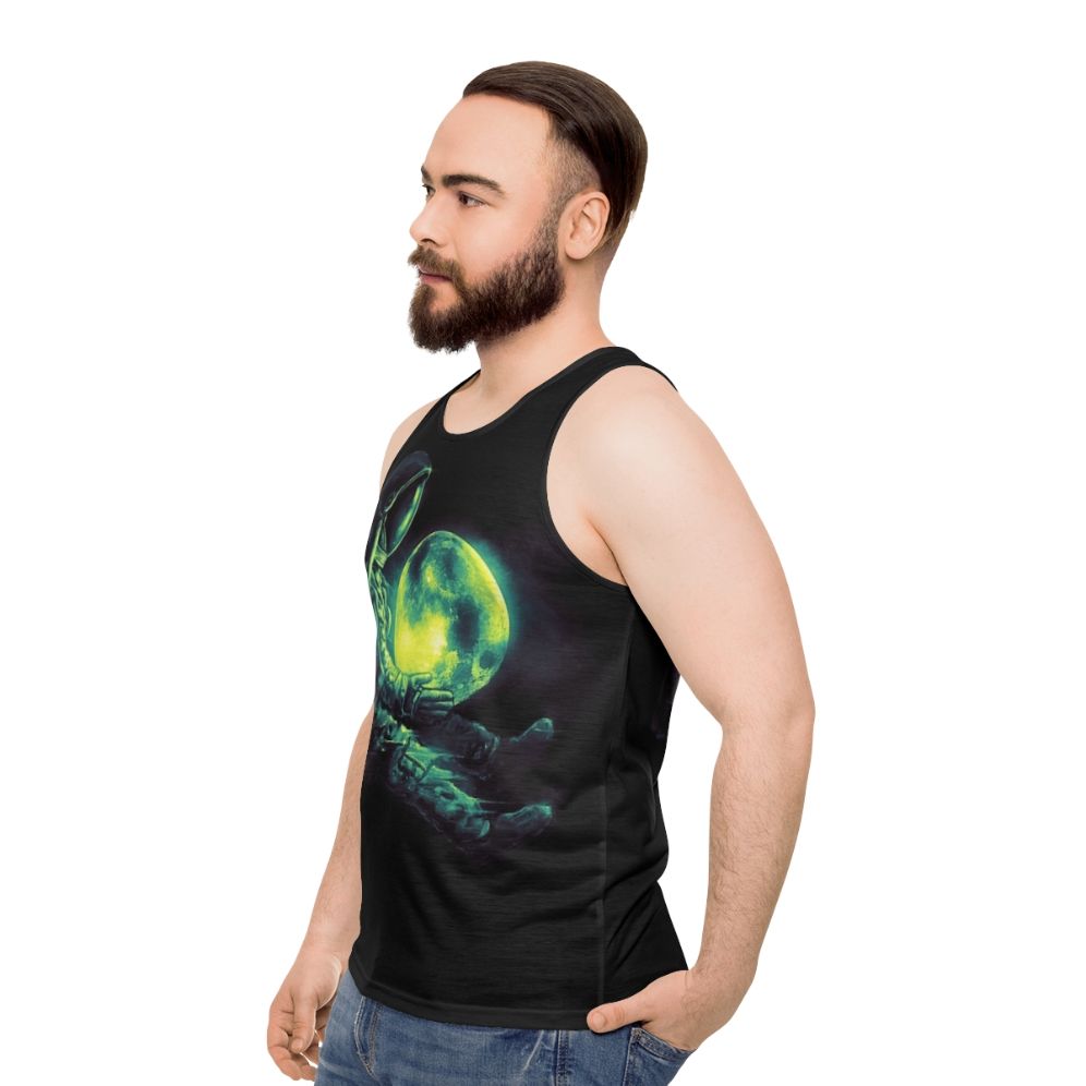 Unisex tank top with a cosmic, galactic design featuring a moon and astronaut - men side