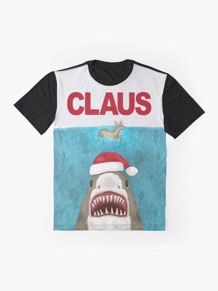 A funny graphic t-shirt featuring a Santa Claus shark with reindeer horns, a humorous Christmas and holiday design. - Flat lay