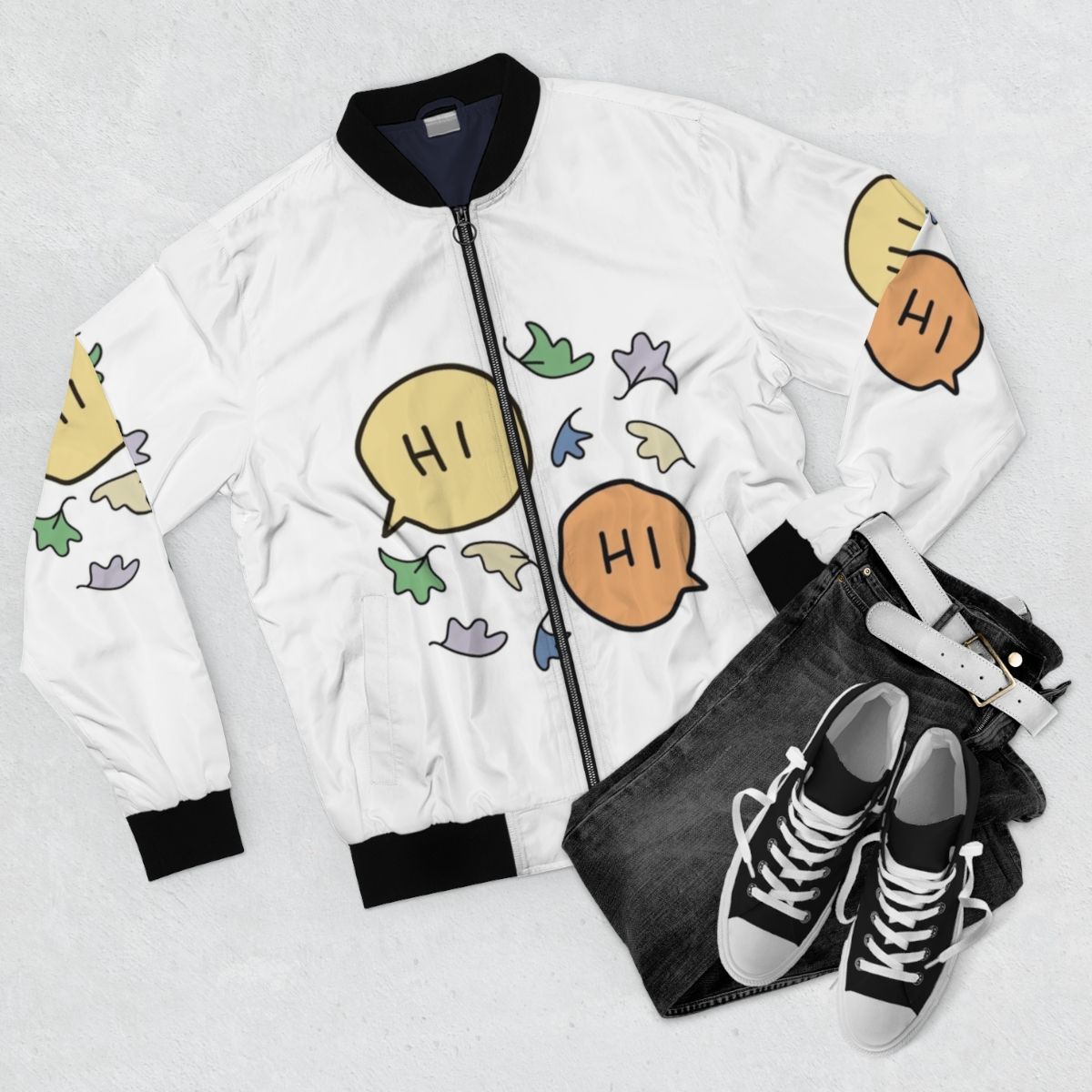 A pastel-colored bomber jacket with a Heartstopper graphic featuring leaves and characters from the series. - Flat lay