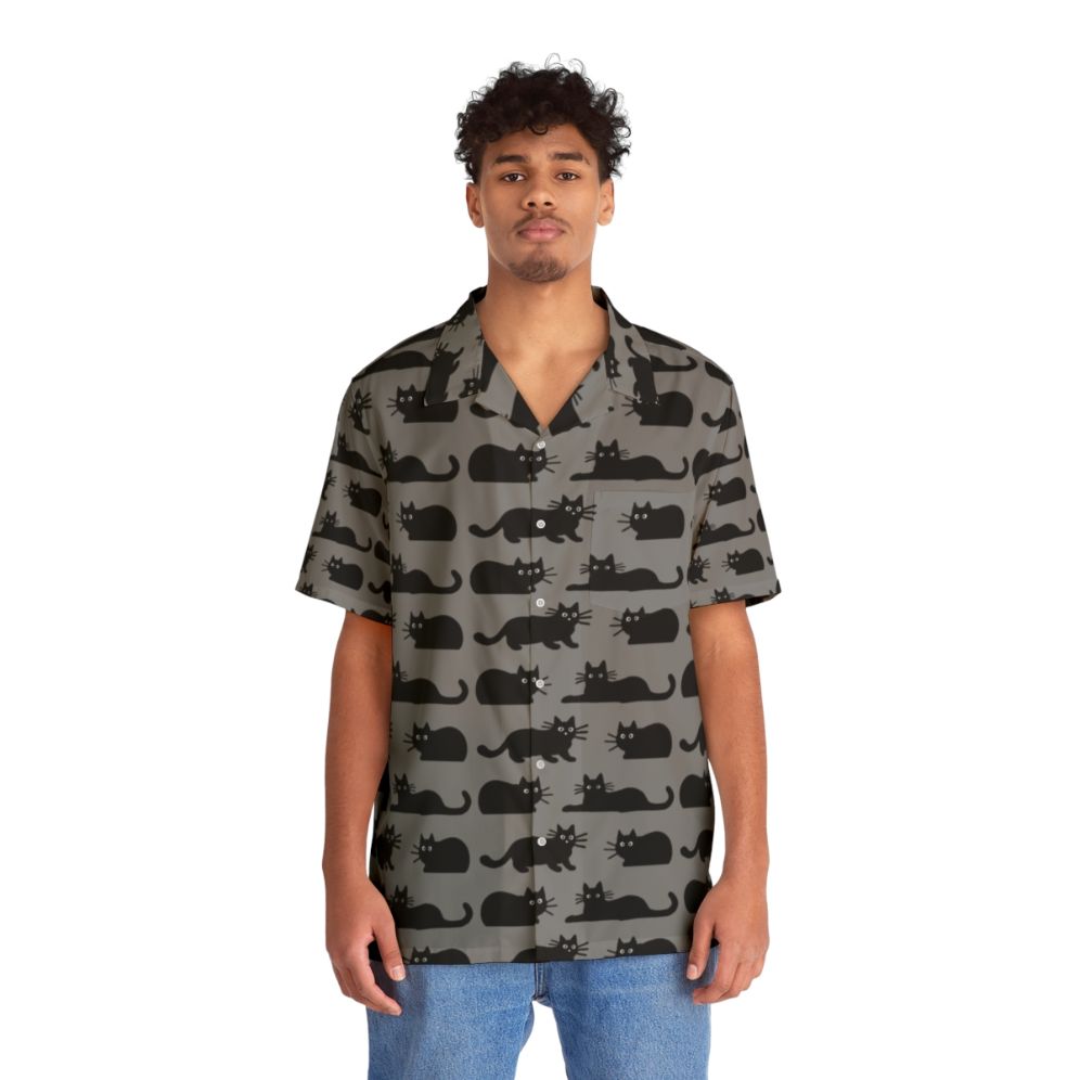 Black cat wearing a Hawaiian-style shirt - People Front