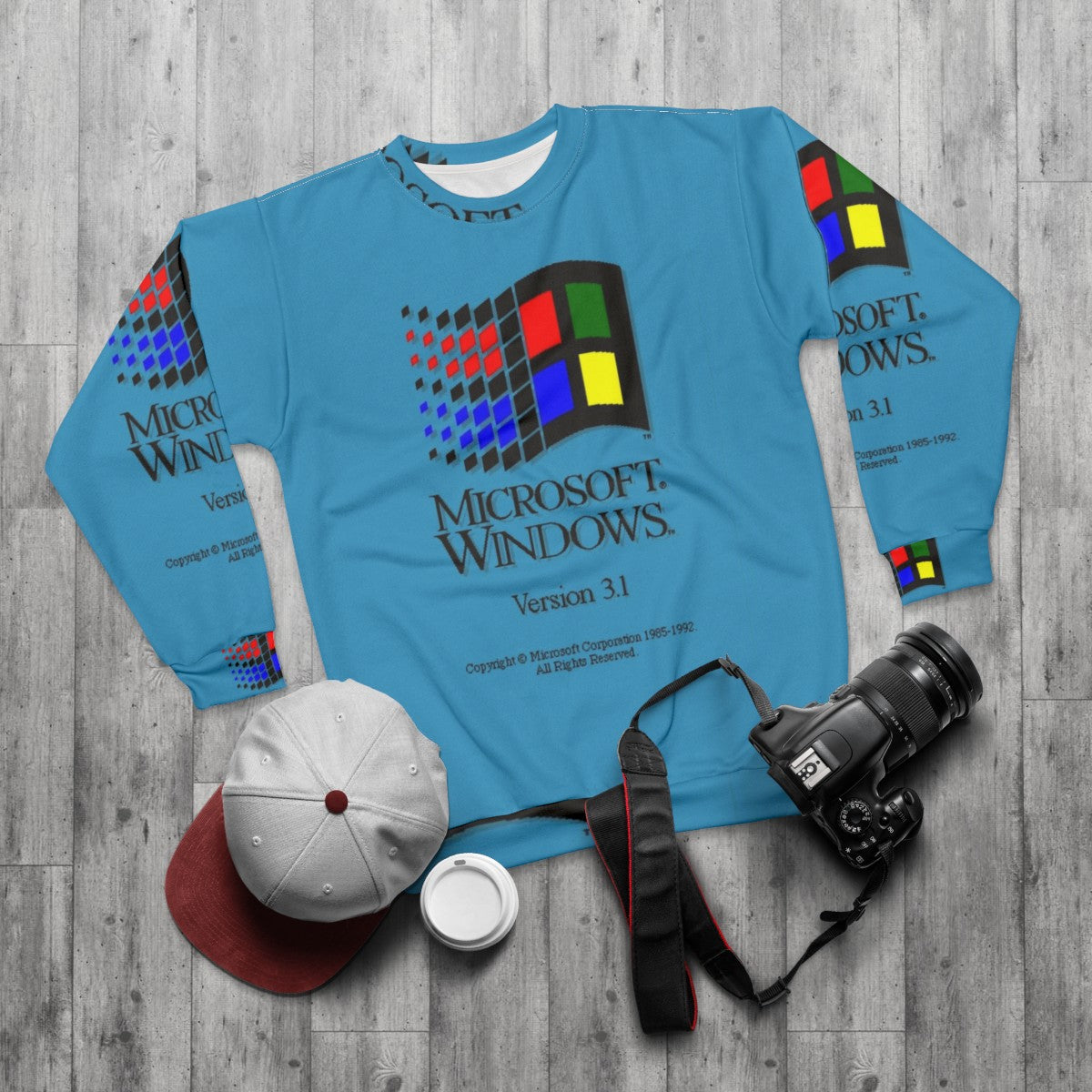 Vintage Windows 3.1 logo on a gray sweatshirt - flat lay