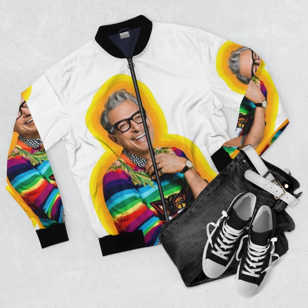 Colorful bomber jacket featuring an image of actor Jeff Goldblum and the word "Happiness" - Flat lay