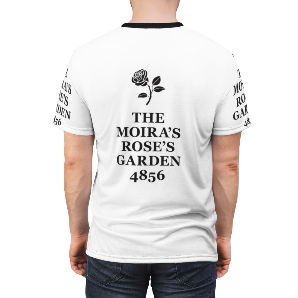 Schitt's Creek inspired minimalist typography t-shirt featuring the name "Moira Rose" in a typewriter-style font against a black background. - men back