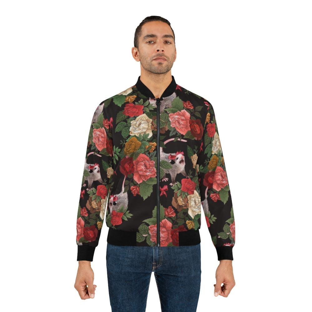 A colorful and quirky bomber jacket featuring a repeating floral pattern with opossums, or possums, in a fun, meme-inspired design. - Lifestyle