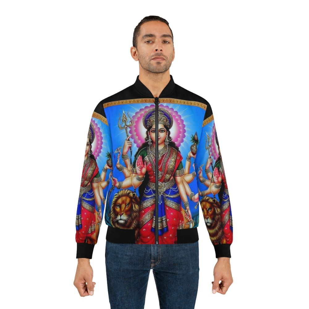 Vintage bomber jacket featuring a Hindu god design with arrows, mountains, staff, and other traditional Indian elements. - Lifestyle