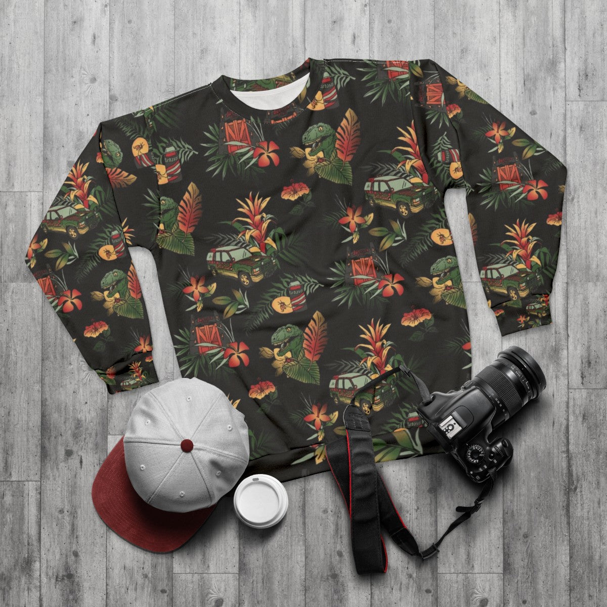 Jurassic themed sweatshirt with dinosaur print design - flat lay