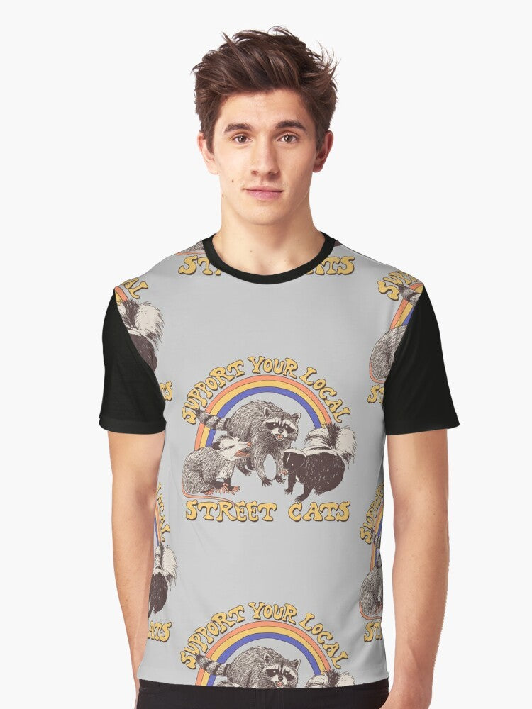 Retro-style graphic t-shirt featuring a design of various street cats, including cats, kittens, possums, skunks, and raccoons. - Men