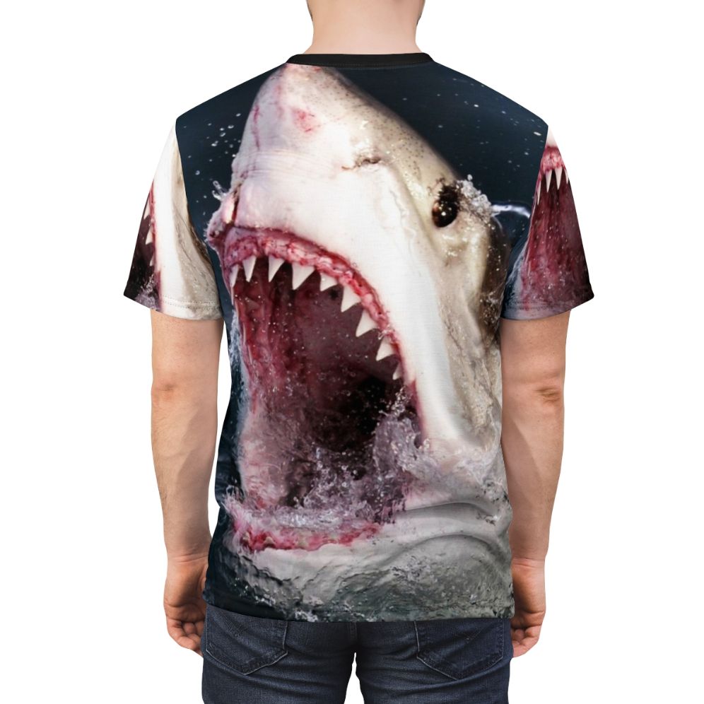 A realistic 3D graphic of a shark taking a bite out of a t-shirt on a solid background. - men back