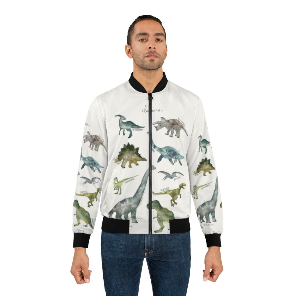 A stylish bomber jacket featuring a vibrant dinosaur design, perfect for nature and animal enthusiasts. - Lifestyle