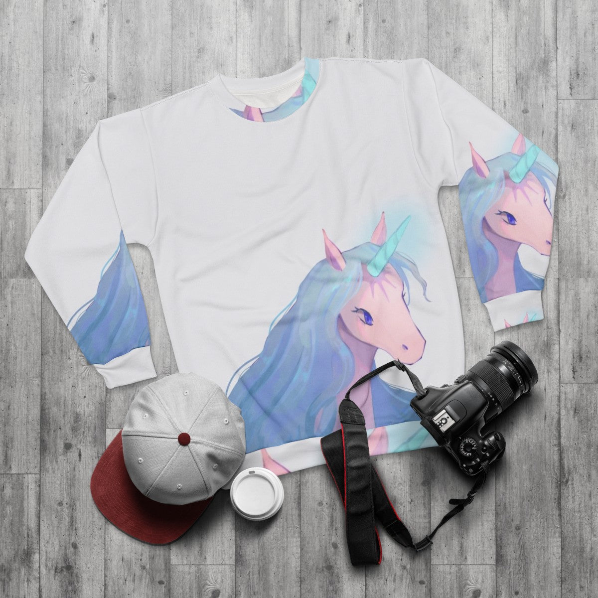 Illustration of The Last Unicorn on a sweatshirt - flat lay