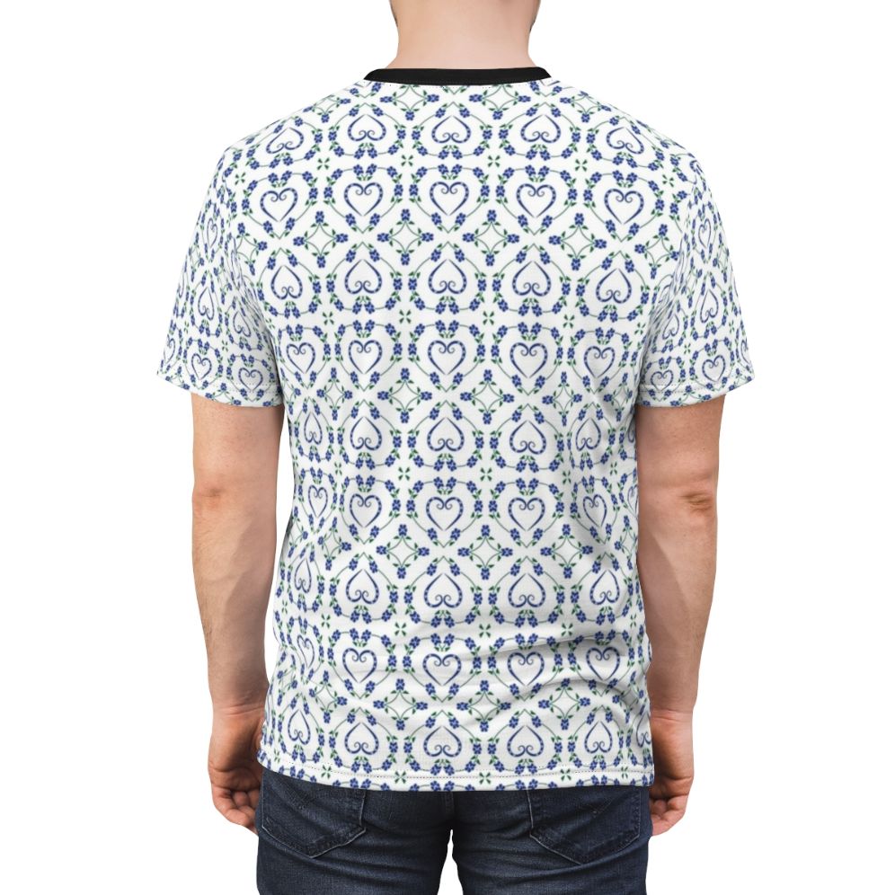 T-shirt with a blue and white pawprint, heart, and flower pattern design for dog moms, dads, and lovers. - men back